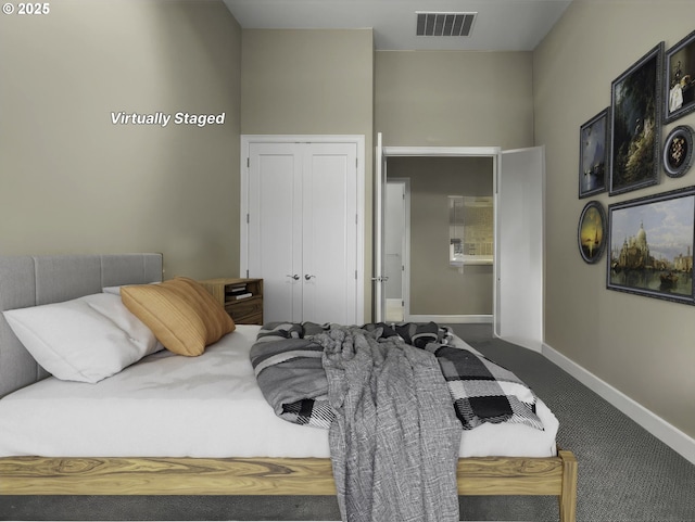 bedroom with a closet and carpet