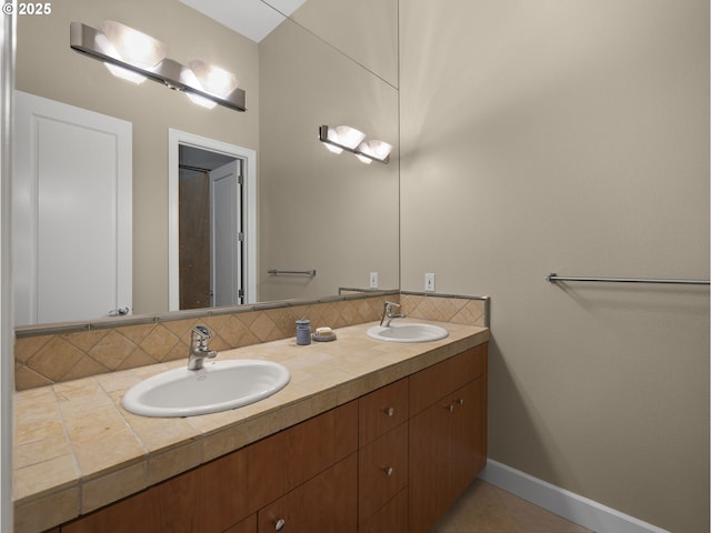 bathroom featuring tile patterned floors and vanity