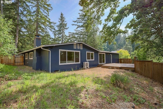 435 E 53rd Ave, Eugene, OR 97405 - rear view of property featuring a chimney, a fenced backyard, and a deck
