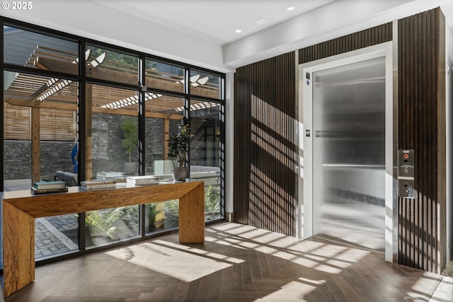 entryway featuring parquet floors