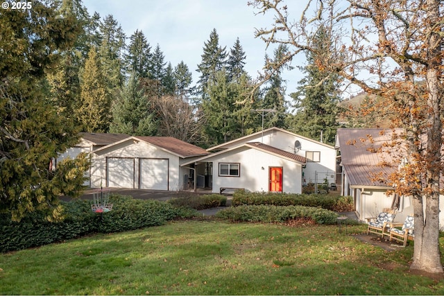 5383 Sunshine Rd, Roseburg, OR 97470 - view of front of house featuring a front lawn, an attached garage, and aphalt driveway