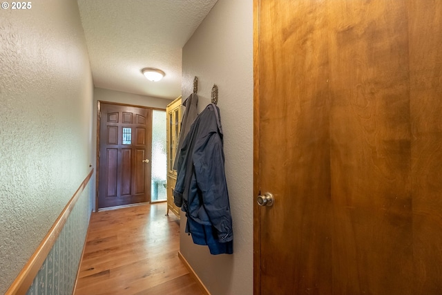 5383 Sunshine Rd, Roseburg, OR 97470 - doorway to outside with a textured wall and wood finished floors