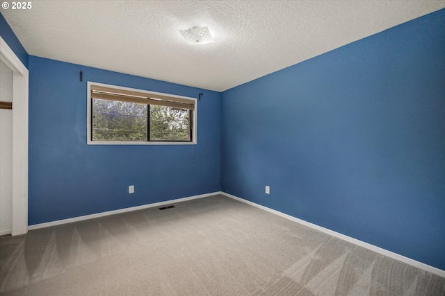 16620 SE Ladd Ct, Milwaukie, OR 97267 - carpeted spare room with a textured ceiling and baseboards