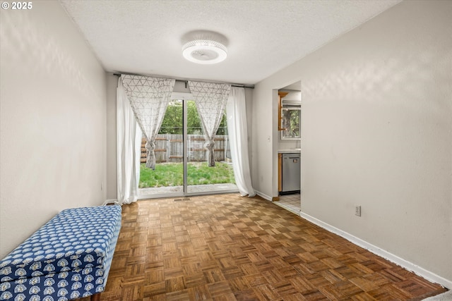16620 SE Ladd Ct, Milwaukie, OR 97267 - empty room featuring baseboards and a textured ceiling