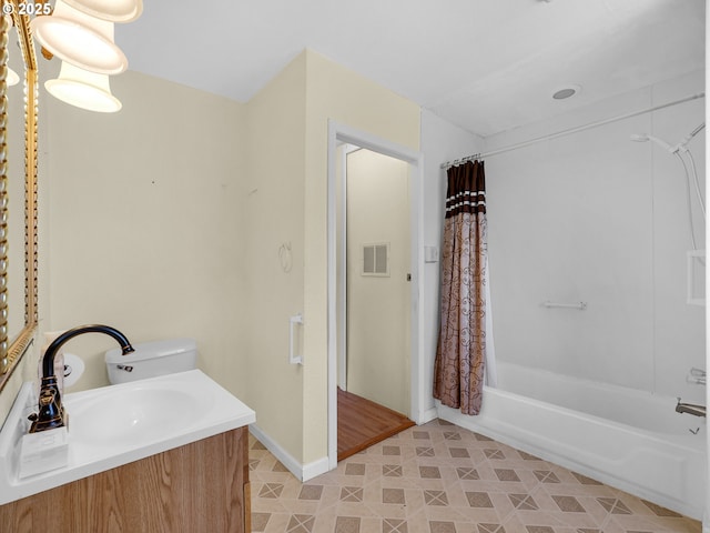 125 SW Cedar Ave, Warrenton, OR 97146 - bathroom featuring vanity, shower / bath combo with shower curtain, and tile patterned flooring