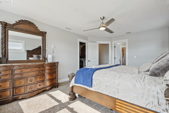 132 N 39th Ct, Ridgefield, WA 98642 - carpeted bedroom with a walk in closet, ceiling fan, and a closet