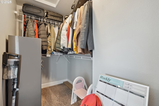 132 N 39th Ct, Ridgefield, WA 98642 - walk in closet featuring carpet floors and water heater
