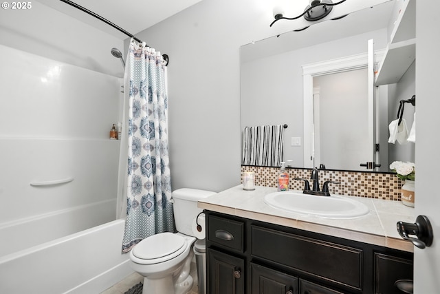 132 N 39th Ct, Ridgefield, WA 98642 - bathroom featuring decorative backsplash, vanity, and shower / bath combo with shower curtain