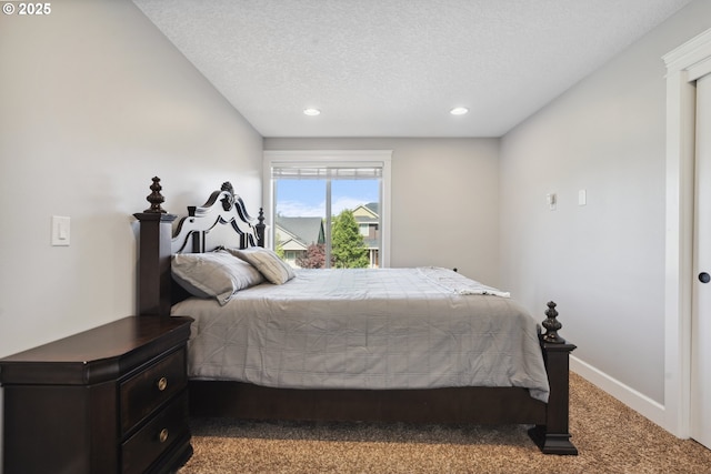 132 N 39th Ct, Ridgefield, WA 98642 - carpeted bedroom with a textured ceiling and recessed lighting