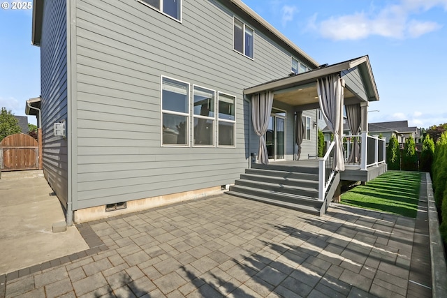132 N 39th Ct, Ridgefield, WA 98642 - rear view of property with a patio and a porch