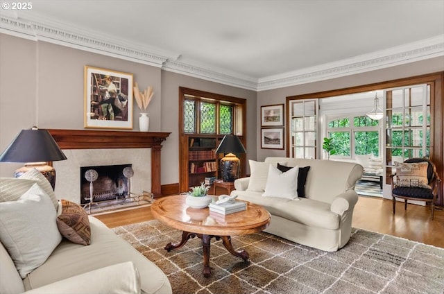 1965 SW Montgomery Pl, Portland, OR 97201 - living room with ornamental molding, wood finished floors, and a fireplace