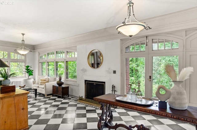 1965 SW Montgomery Pl, Portland, OR 97201 - living room with dark flooring, a fireplace, and crown molding