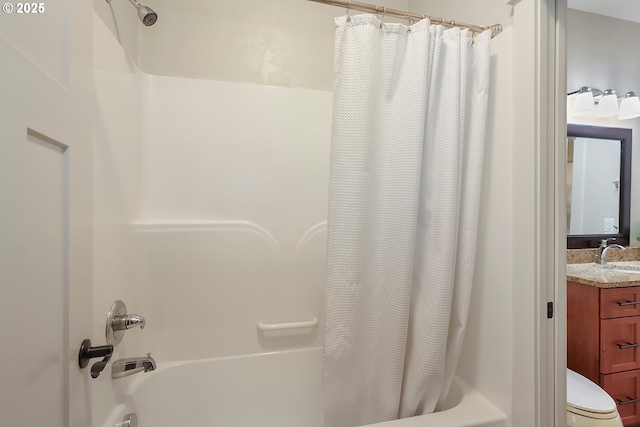full bathroom featuring vanity, toilet, and shower / bath combo with shower curtain