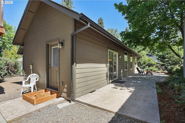 view of property exterior featuring a patio