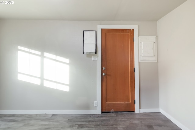 spare room with hardwood / wood-style floors