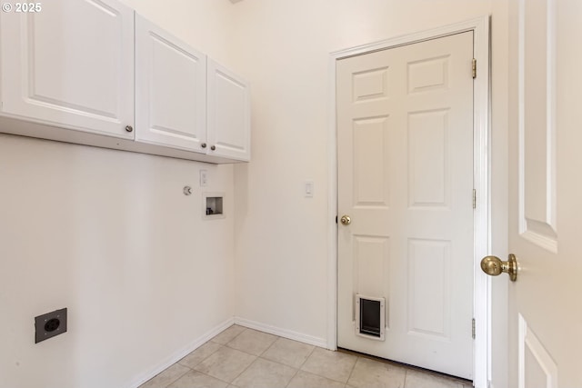 laundry room featuring washer hookup, light tile patterned floors, cabinet space, hookup for an electric dryer, and baseboards