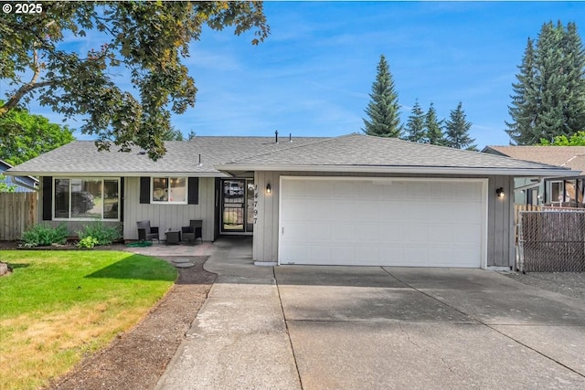 14797 SW Willamette St, Sherwood, OR 97140 - single story home featuring a garage, driveway, roof with shingles, and board and batten siding