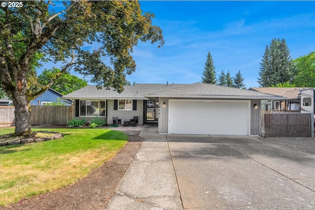 14797 SW Willamette St, Sherwood, OR 97140 - ranch-style house with an attached garage, concrete driveway, board and batten siding, and roof with shingles
