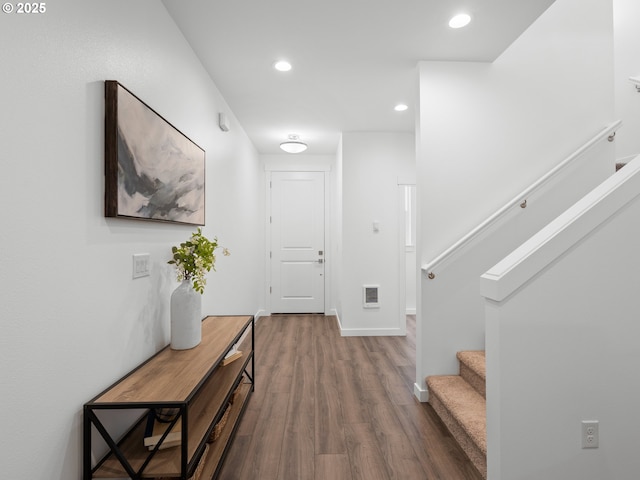 foyer entrance with wood-type flooring