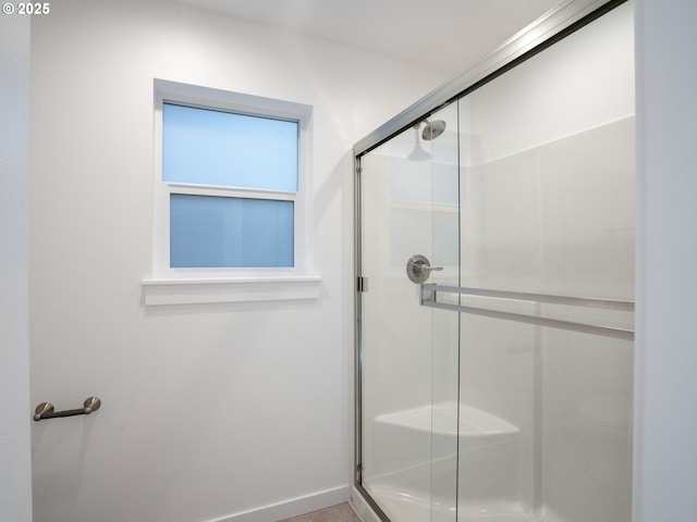 bathroom with an enclosed shower