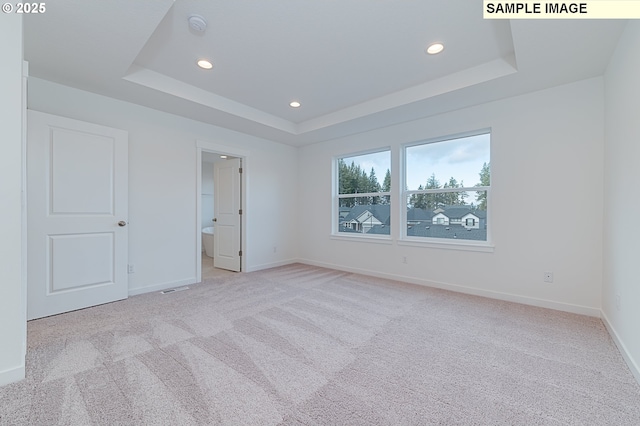 1496 NE Josephine Ct Unit 181, Estacada, OR 97023 - unfurnished bedroom featuring recessed lighting, a raised ceiling, baseboards, carpet floors, and ensuite bathroom
