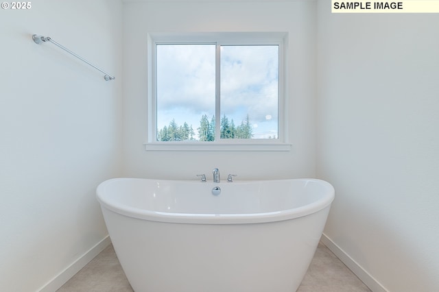 1496 NE Josephine Ct Unit 181, Estacada, OR 97023 - bathroom featuring a soaking tub and baseboards