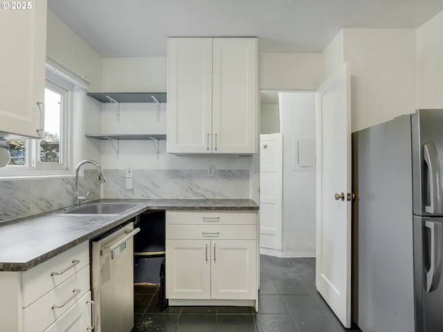 12226 SE Raymond St, Portland, OR 97236 - kitchen featuring appliances with stainless steel finishes, a sink, open shelves, and white cabinets