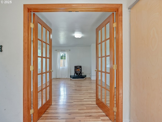 12226 SE Raymond St, Portland, OR 97236 - corridor featuring french doors and wood finished floors