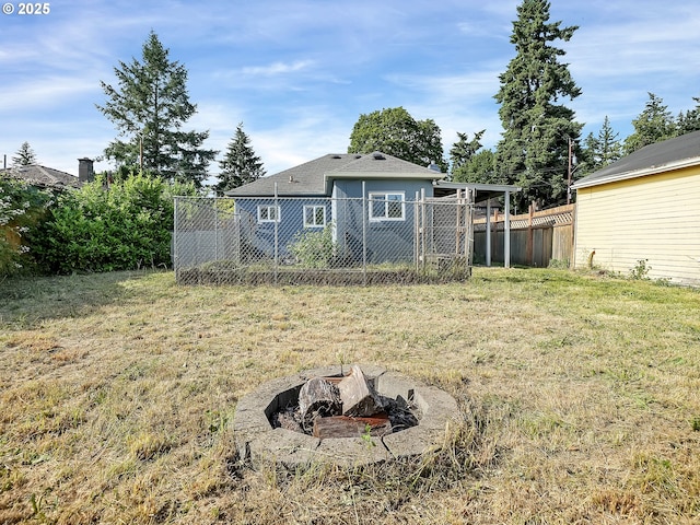 12226 SE Raymond St, Portland, OR 97236 - back of property featuring an outdoor fire pit