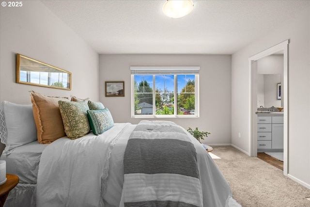 31363 NW N Ave, North Plains, OR 97133 - carpeted bedroom featuring baseboards and connected bathroom
