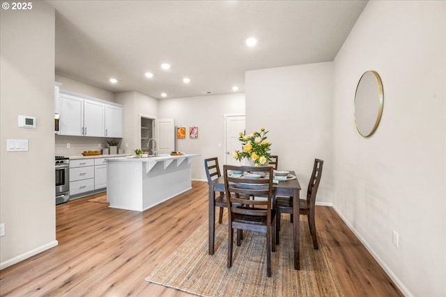 31363 NW N Ave, North Plains, OR 97133 - dining space featuring light wood-type flooring, recessed lighting, and baseboards