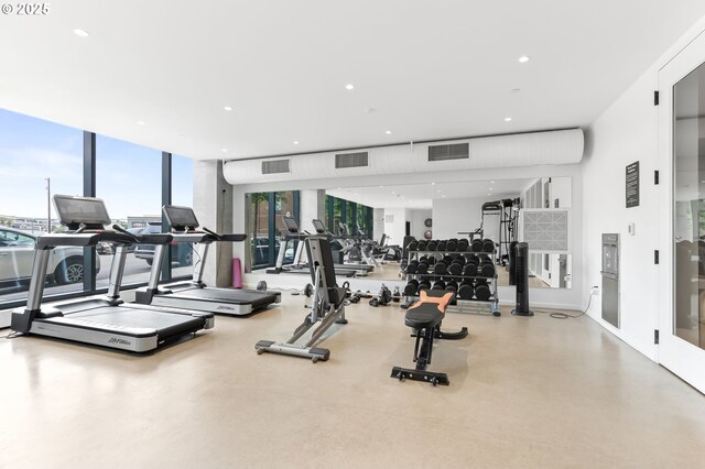 1150 NW Quimby St Unit 442, Portland, OR 97209 - exercise room with recessed lighting and a wall of windows