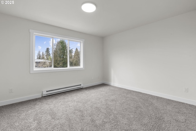 carpeted spare room featuring baseboards and baseboard heating