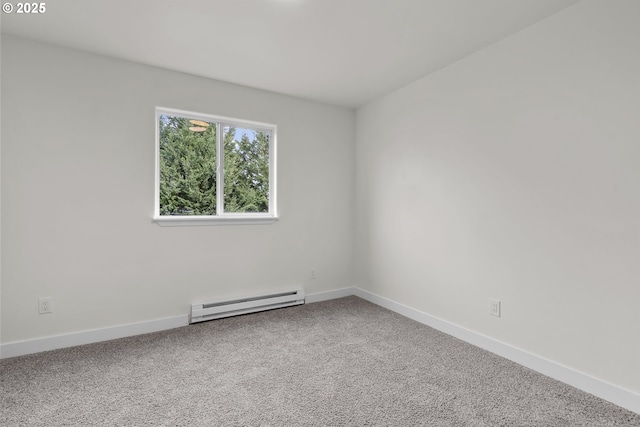 unfurnished room featuring carpet floors, baseboards, and a baseboard heating unit