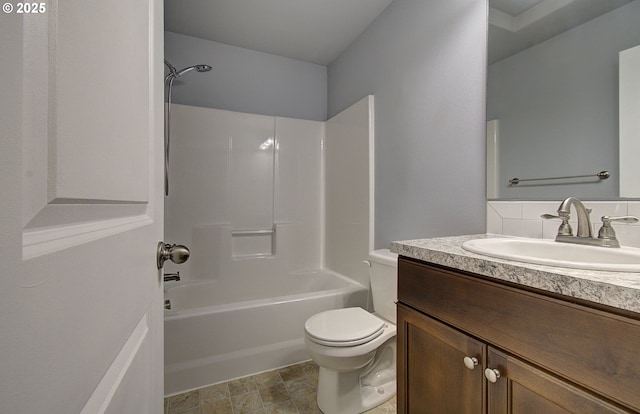 full bathroom with shower / tub combination, toilet, and vanity