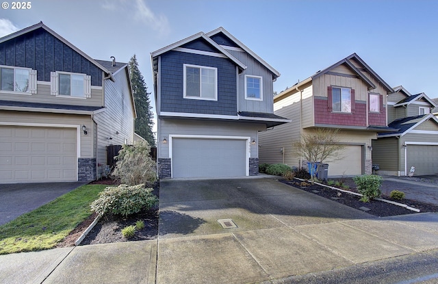 craftsman-style house featuring board and batten siding, concrete driveway, an attached garage, and stone siding