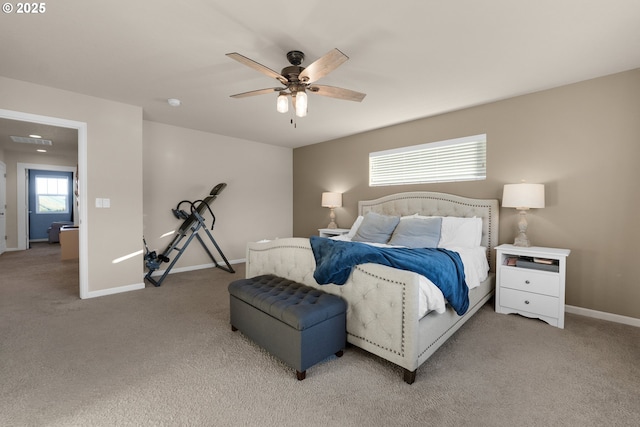 bedroom featuring ceiling fan and carpet flooring