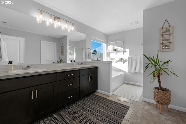 bathroom with vanity, shower with separate bathtub, and tile patterned flooring