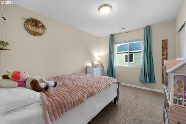 bedroom featuring light carpet