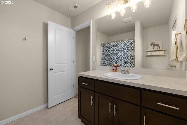 bathroom with vanity and a shower with curtain