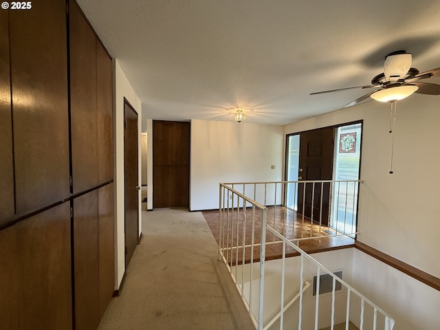 5235 SE 32nd Ave, Portland, OR 97202 - hallway featuring an upstairs landing and light carpet