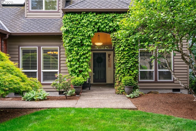 5666 Grand Oaks Dr, Lake Oswego, OR 97035 - view of exterior entry featuring roof with shingles