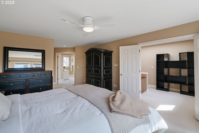 bedroom featuring baseboards, ceiling fan, and light carpet