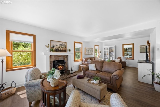 living room featuring wood finished floors and baseboards