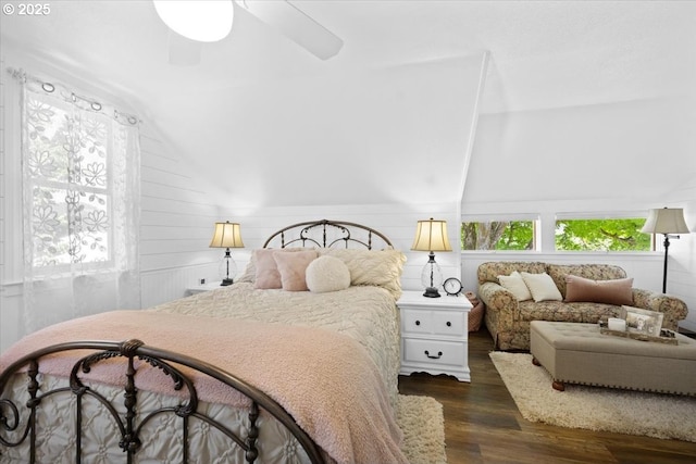 bedroom featuring lofted ceiling, dark wood-style floors, and ceiling fan