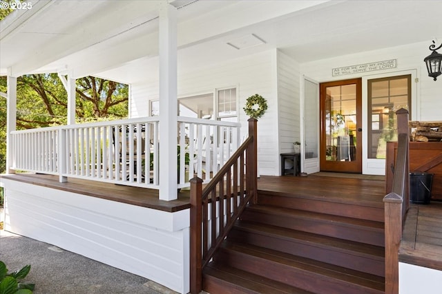doorway to property featuring covered porch