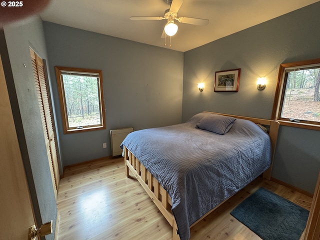 118 Noble Fir, Goldendale, WA 98620 - bedroom featuring light wood-type flooring, baseboards, and a ceiling fan