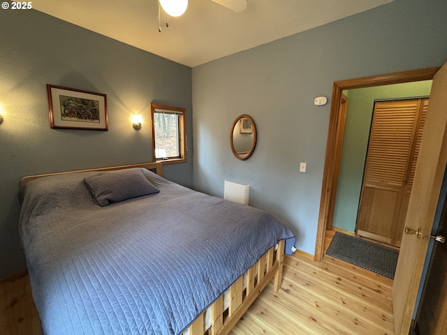118 Noble Fir, Goldendale, WA 98620 - bedroom featuring light wood-type flooring, ceiling fan, and baseboards