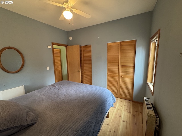 118 Noble Fir, Goldendale, WA 98620 - bedroom featuring two closets, light wood finished floors, and a ceiling fan
