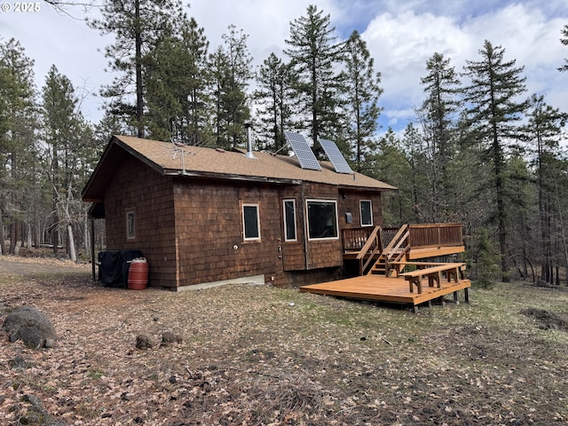 118 Noble Fir, Goldendale, WA 98620 - back of house with a wooden deck and roof with shingles